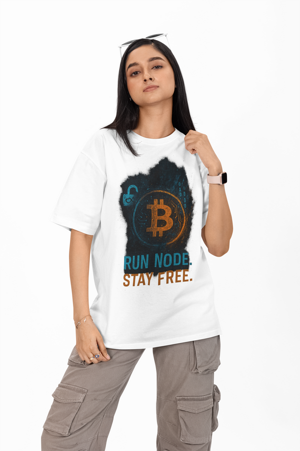 Person wearing a white t-shirt with Bitcoin graphic and text