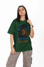 Person wearing a green t-shirt with Bitcoin design and text on a white background
