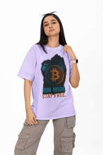 Person wearing a light purple t-shirt with Bitcoin design and text on a white background