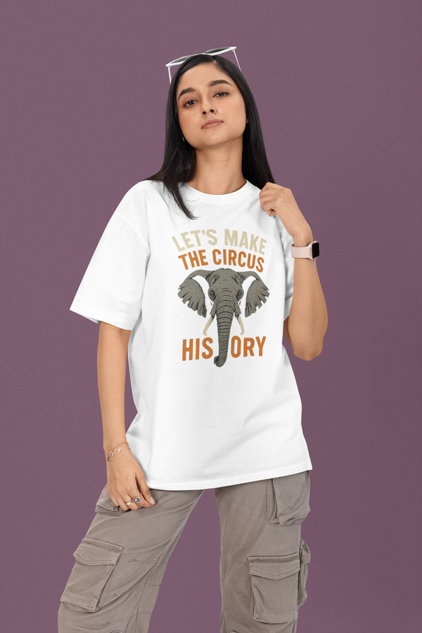 Person wearing a white t-shirt with an elephant graphic and text on a purple background