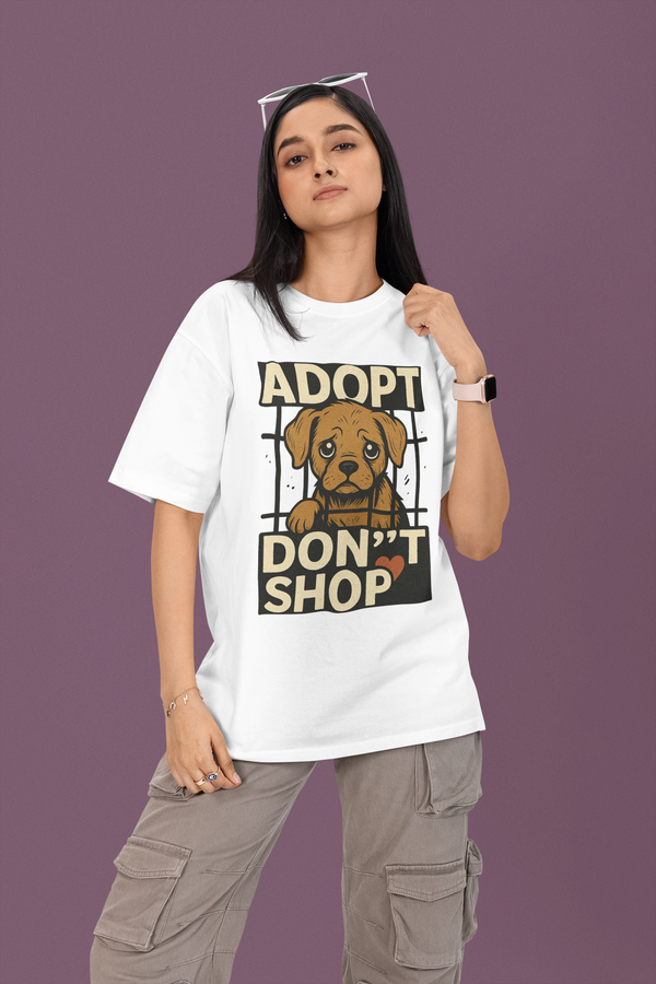 Person wearing a white t-shirt with a dog adoption graphic on a purple background